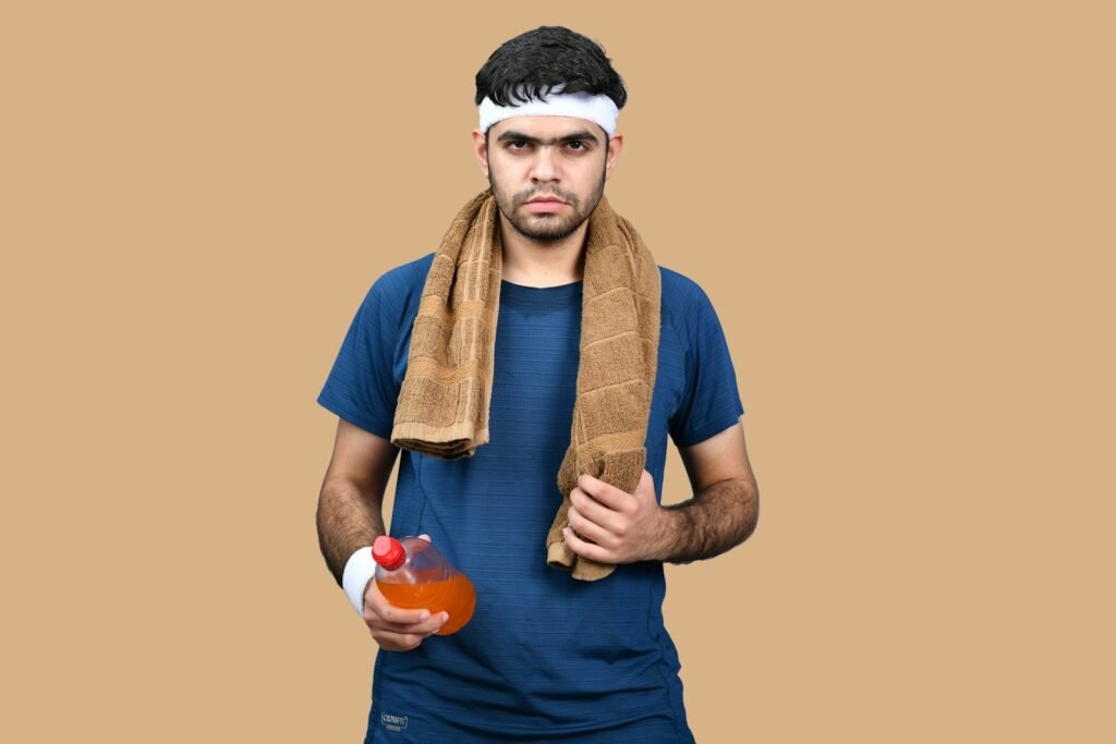a man holding a jar of food